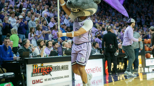Jan 28, 2023; Manhattan, Kansas, USA; Kansas State Wildcats mascot Willie with the Kansas State Wildcats flag prior to the game against the Florida Gators at Bramlage Coliseum. Mandatory Credit: William Purnell-USA TODAY Sports